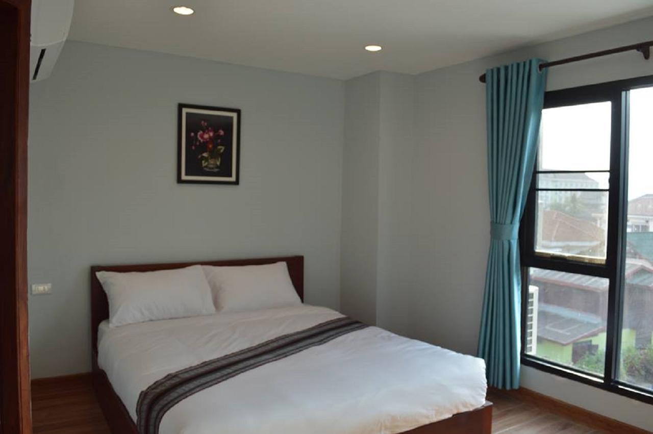 Tna Hotel 万荣 外观 照片