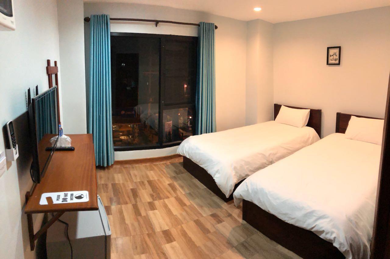 Tna Hotel 万荣 外观 照片