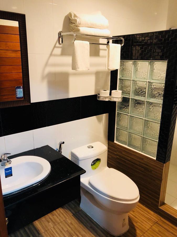 Tna Hotel 万荣 外观 照片