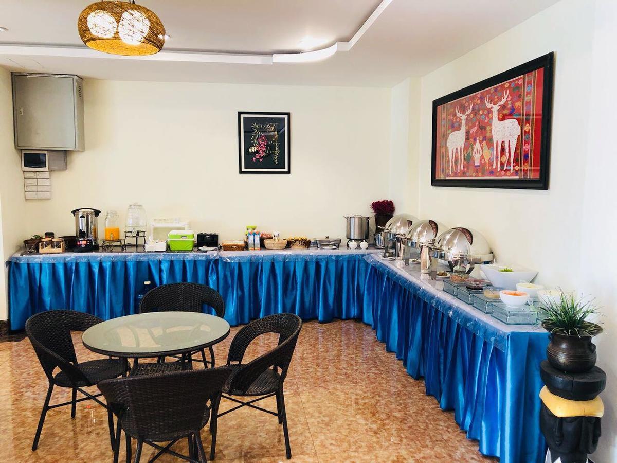 Tna Hotel 万荣 外观 照片