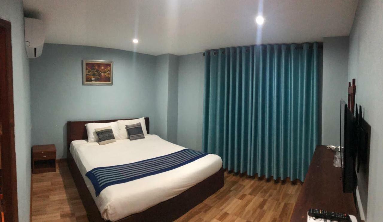 Tna Hotel 万荣 外观 照片