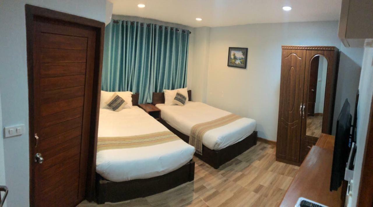 Tna Hotel 万荣 外观 照片